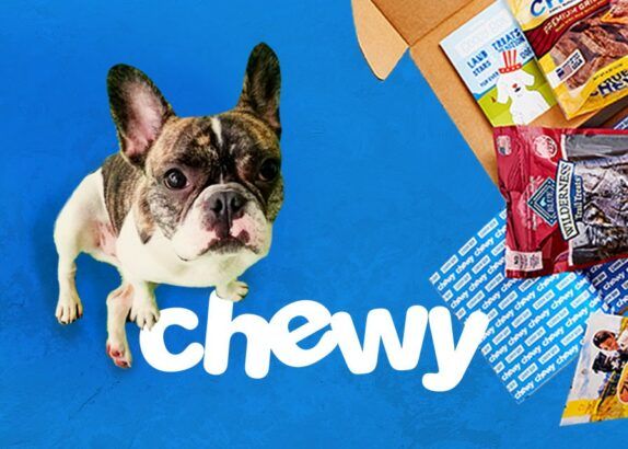 Cute dog with Chewy logo and treats